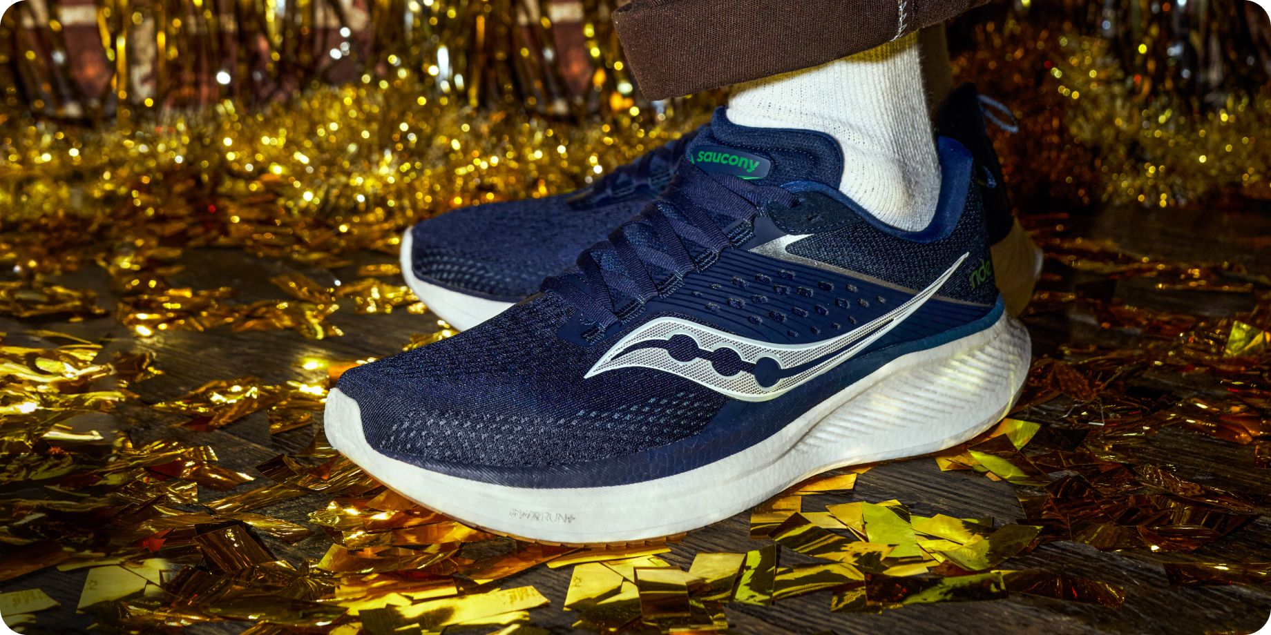 a pair of blue and white Saucony sneakers