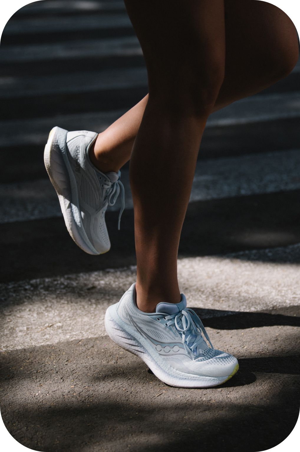 a pair of running shoes on a metal pole