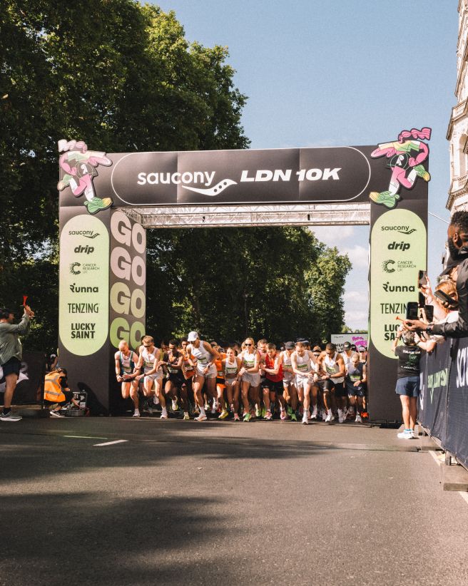 a group of people running in a race