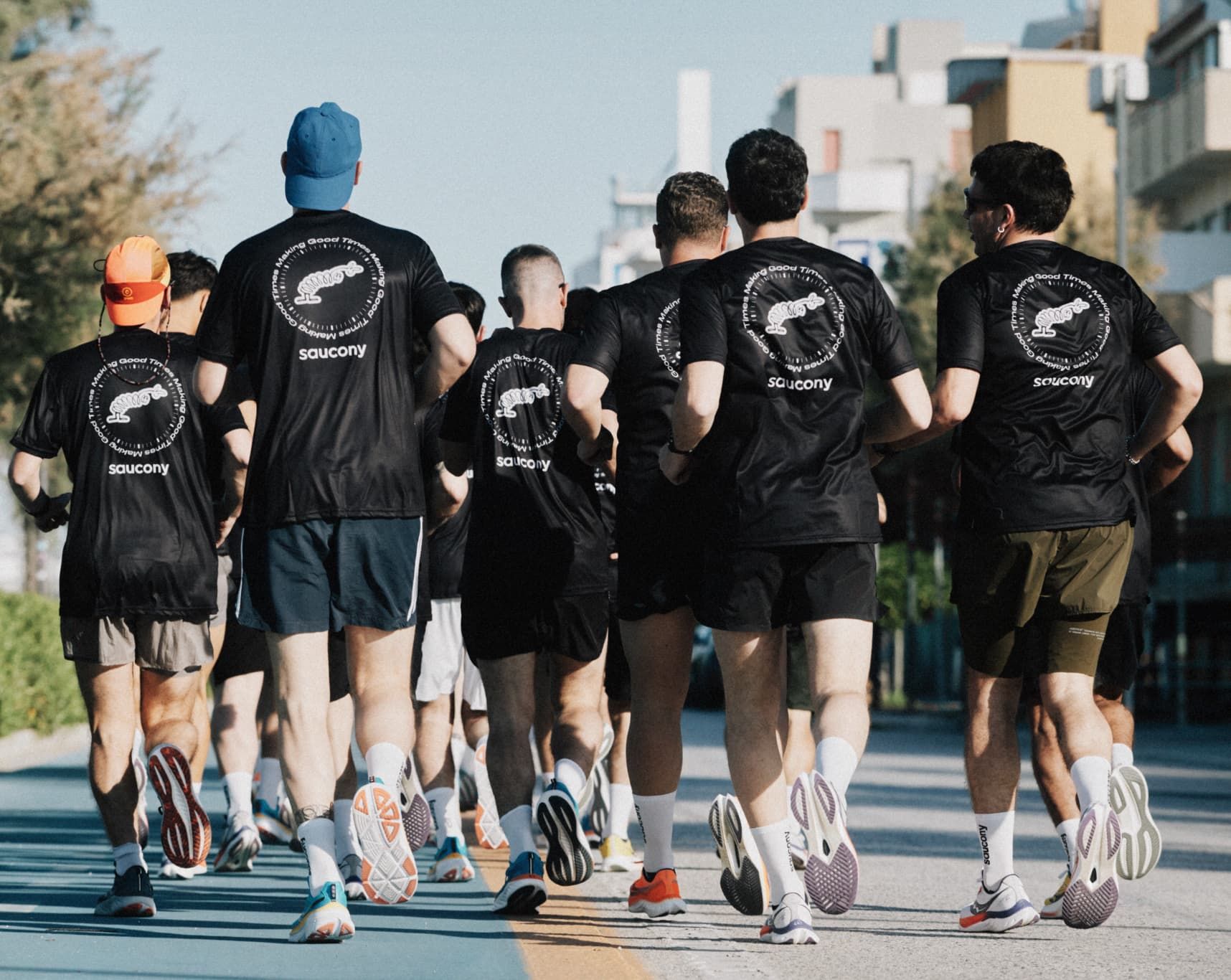 a group of people in black shirts