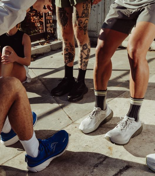 a group of people wearing socks and shoes