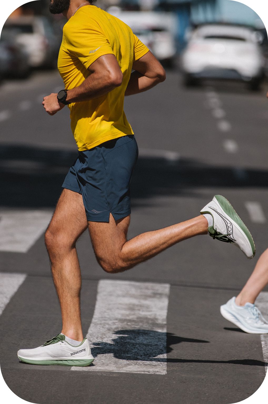 a pair of running shoes on a metal pole